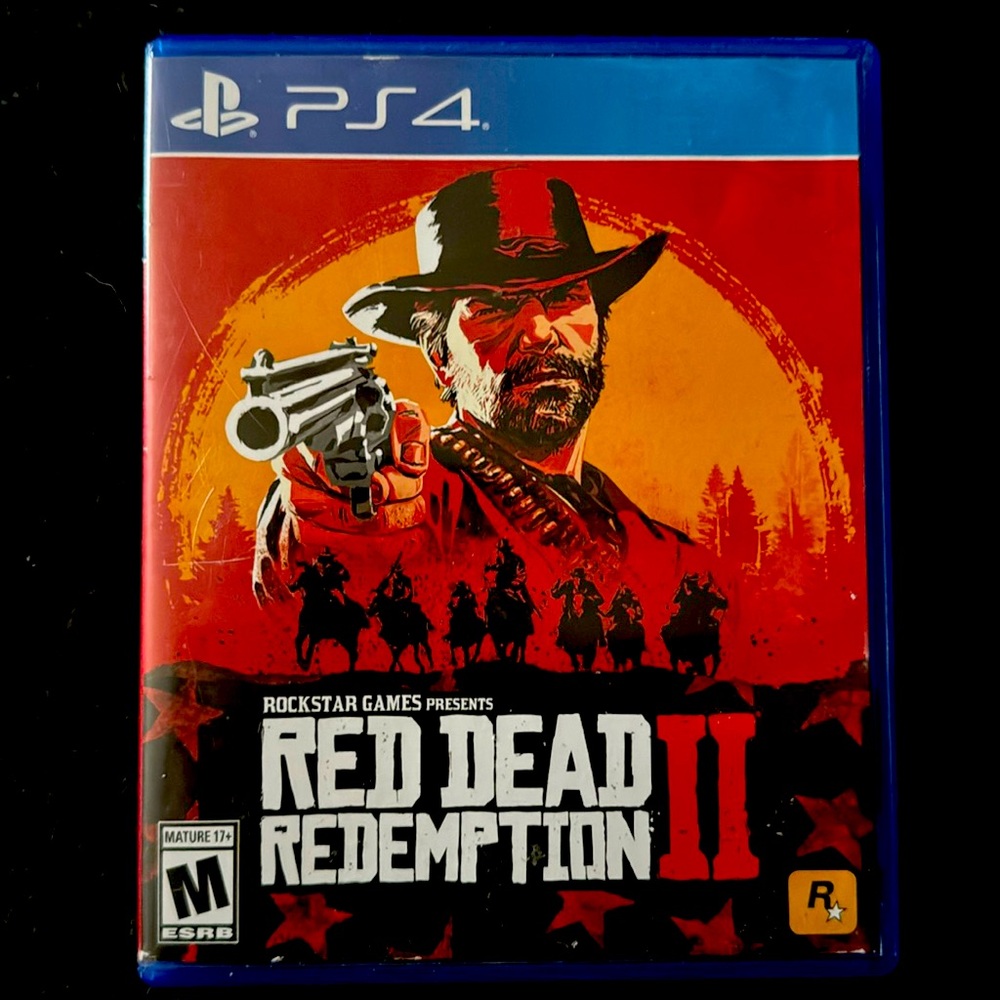 PS4 Red Redemption 2(rockstar games). Rated M for mature 17+. 2 disc. Used